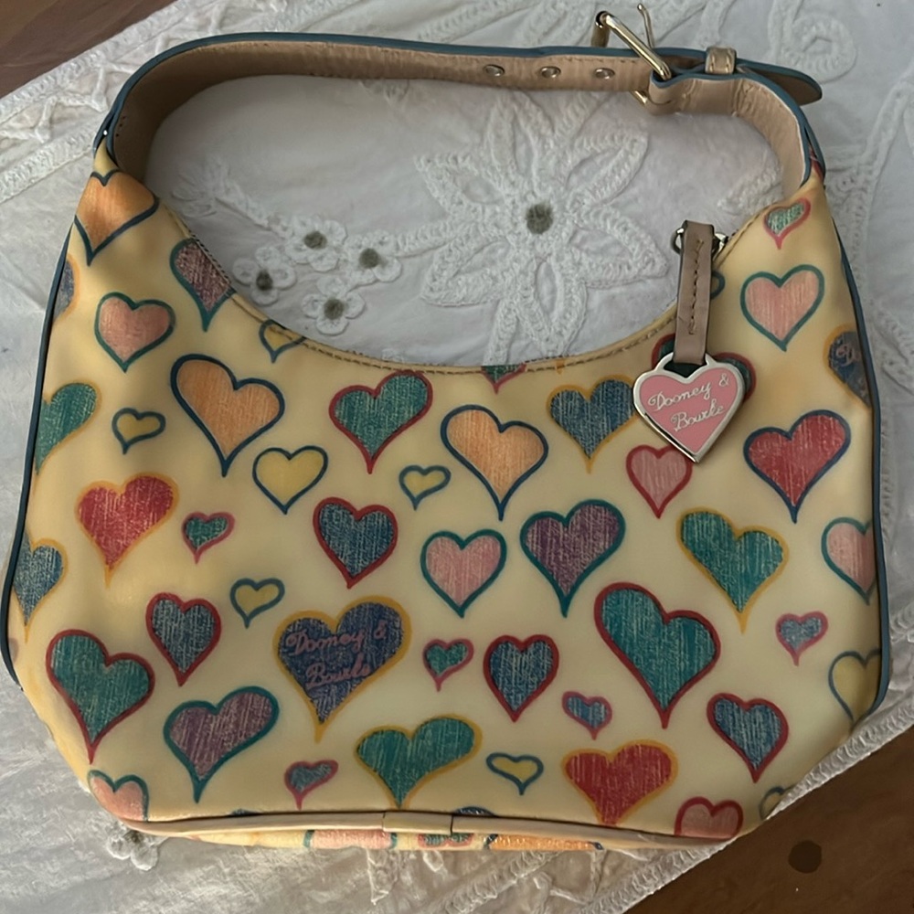 Authentic Vintage Dooney & Bourke beautiful heart purse in good used  condition